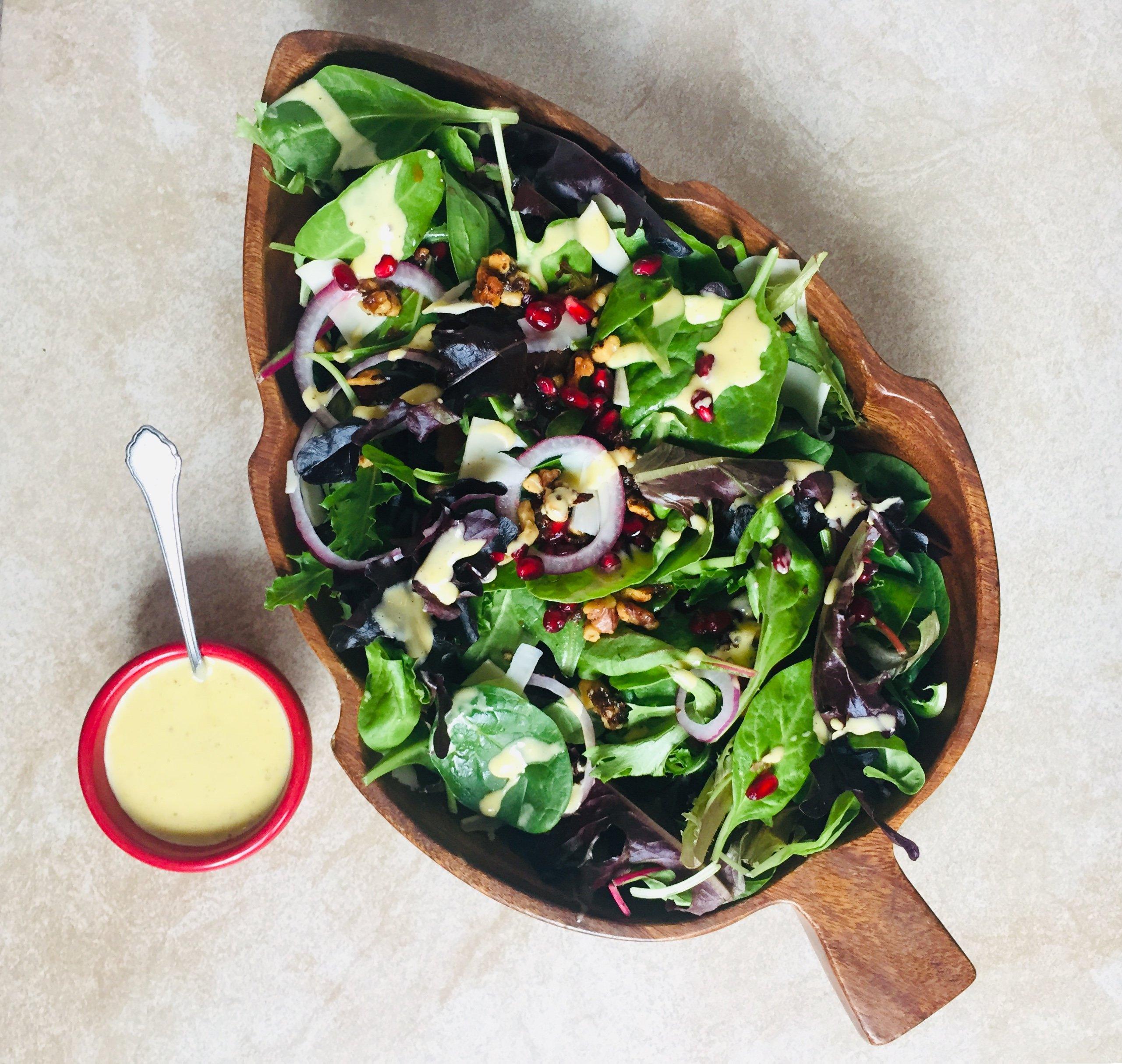 Winter Green Salad with Citrus Clove Dressing and Pomegranate Arils